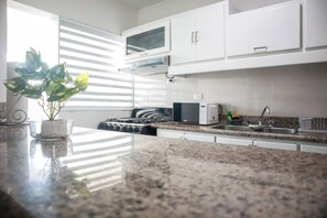 Fridge, microwave, oven, stovetop