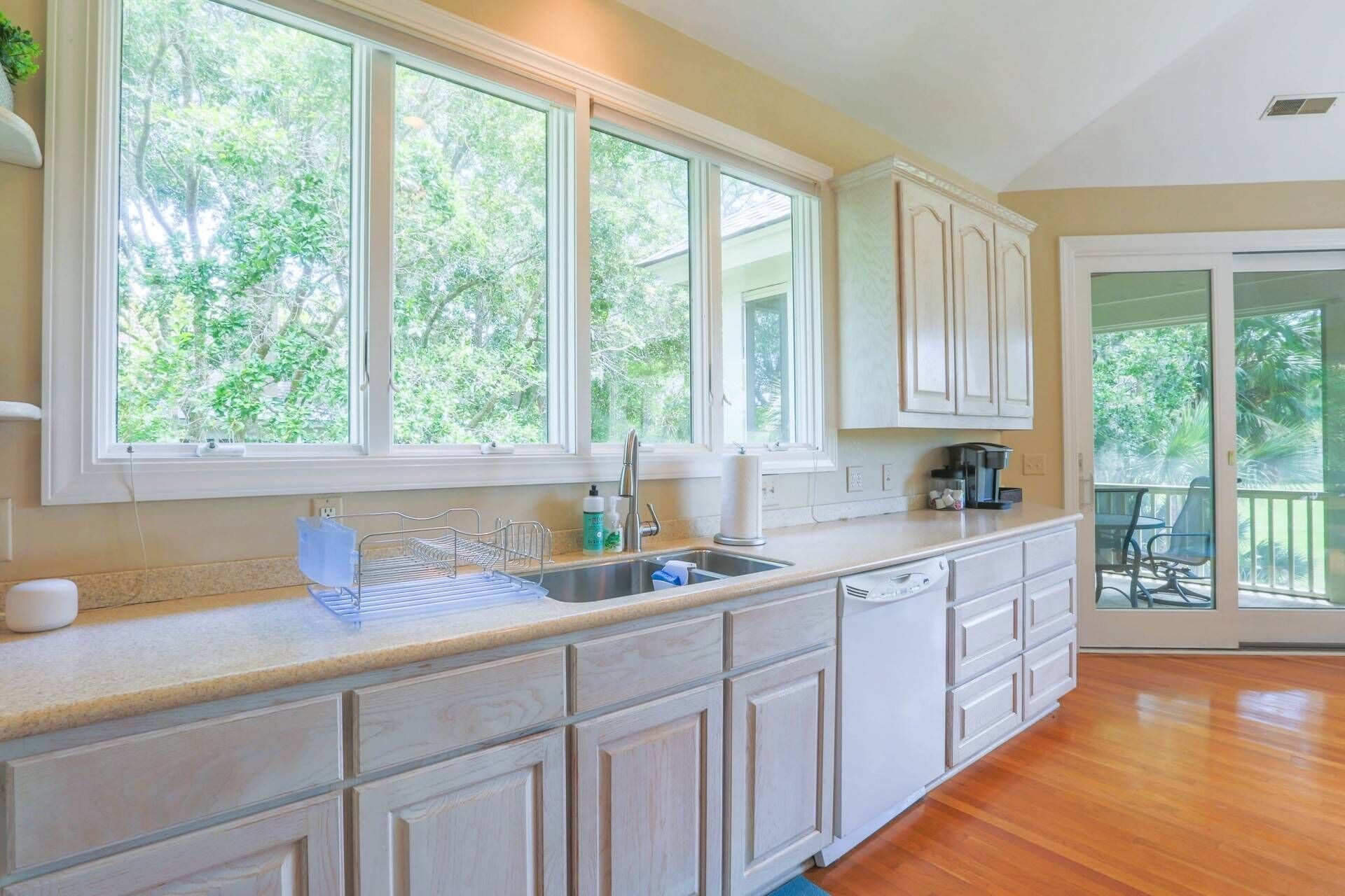 Gorgeous Natural Light, Vaulted Ceilings & Fairway Views.  Back Deck & Screened Porch.
