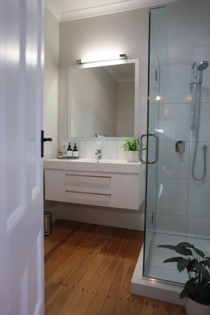 Shower, hair dryer, bathrobes, towels