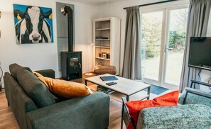 TV, fireplace, books, stereo - Kleine Horizon 100 atmospheric holiday bungalow with garden and privacy (Renesse)