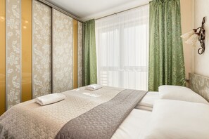 Apartment, 2 Bedrooms, Terrace | 2 bedrooms, desk, bed sheets - Bocianie Gniazdo Apartments by Renters (Kolobrzeg)