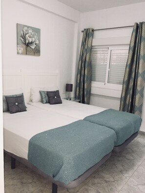 1 chambre, fer et planche à repasser, Wi-Fi gratuit, draps fournis