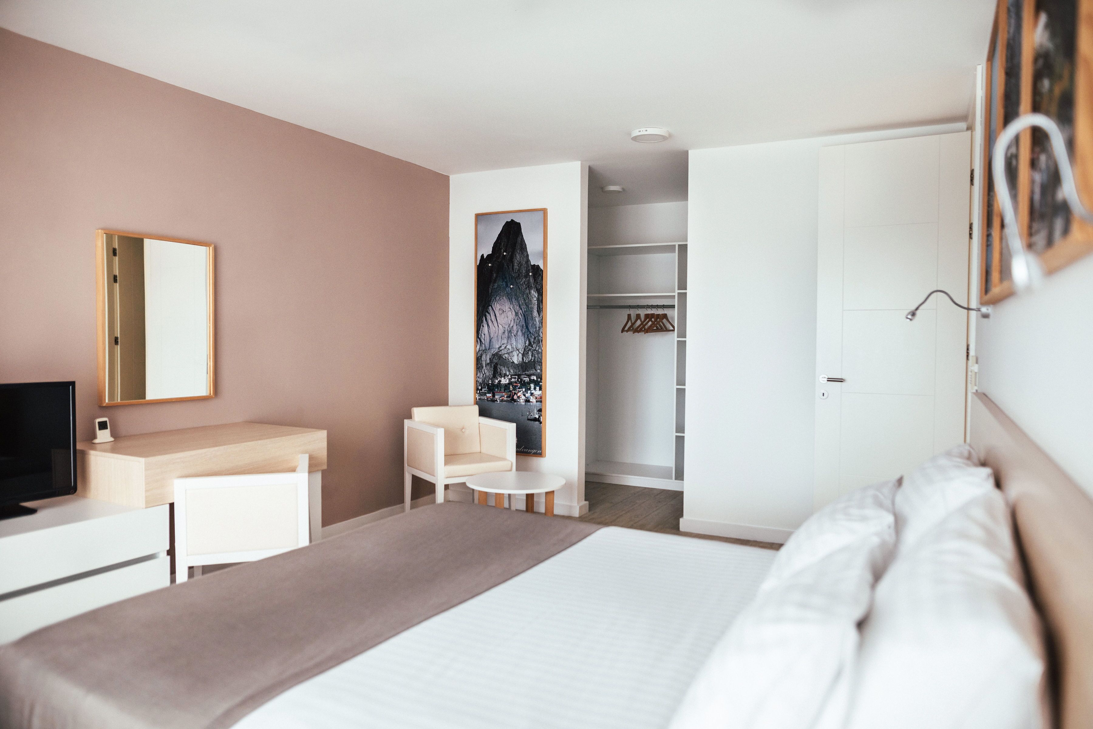 Apartment, 2 Bedrooms, Partial Sea View | In-room safe, desk, laptop workspace, blackout drapes