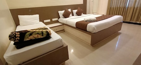 Ropa de cama hipoalergénica y tabla de planchar con plancha