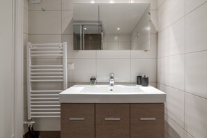 Shower, hair dryer, soap, shampoo