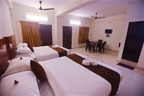 Habitación cuádruple superior | Sábanas de algodón egipcio y ropa de cama de alta calidad 