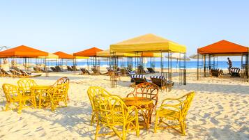 On the beach, white sand