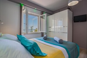 2 عدّة غرف نوم ومكواة/لوح كي وواي فاي