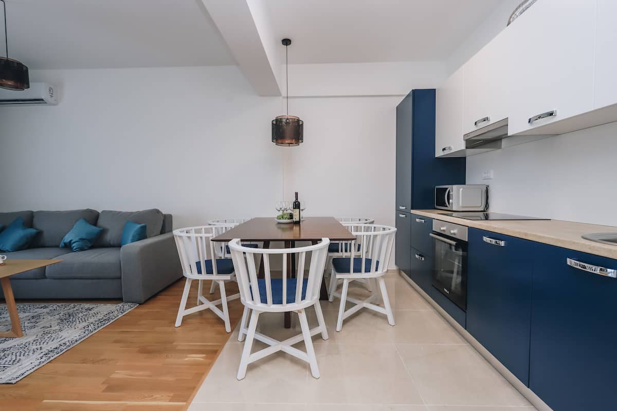 Apartment | Private kitchen | Full-sized fridge, oven, stovetop, dishwasher