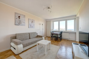 City Apartment | Living area | 42-inch LED TV with cable channels, TV