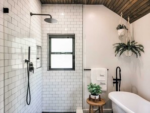 Bathtub, hair dryer, towels