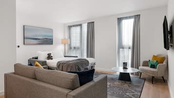 One Bedroom Family Apartment | Living area | 50-inch TV with digital channels