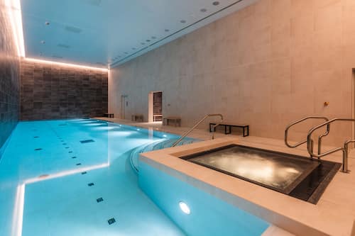 Indoor pool, open 6:00 AM to 10:00 PM, pool loungers