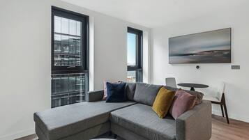 Studio | Living area | 50-inch TV with digital channels