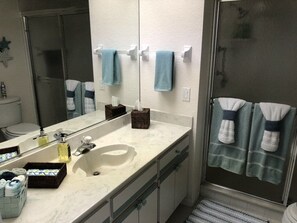 Shower, jetted bath, hair dryer, towels