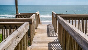A wooden boardwalk leading to a beach with a clear view of the ocean. - Gemini Dream #102 - Soundfront w/ Pool, Boat Dock, Elevator, Dogs Allowed! (Topsail Beach)