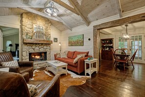 Smart TV, fireplace, table football, books