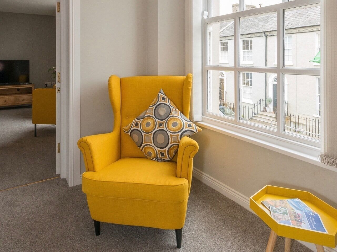 Comfy entrance hall to read your book......