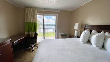 Quarto, 1 cama King, vista para o mar | Cortinas blackout, Wi-Fi de cortesia, roupa de cama