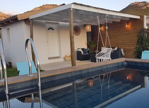 حمّام سباحة خارجي، حمّام سباحة مُدفَّأ