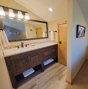 Combined shower/tub, hair dryer, towels, soap