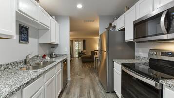 Condo (Patriot Place - Walk-in NO STAIRS - S) | Private kitchen | Fridge, cookware/dishes/utensils