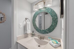 Combined shower/tub, towels, soap, shampoo