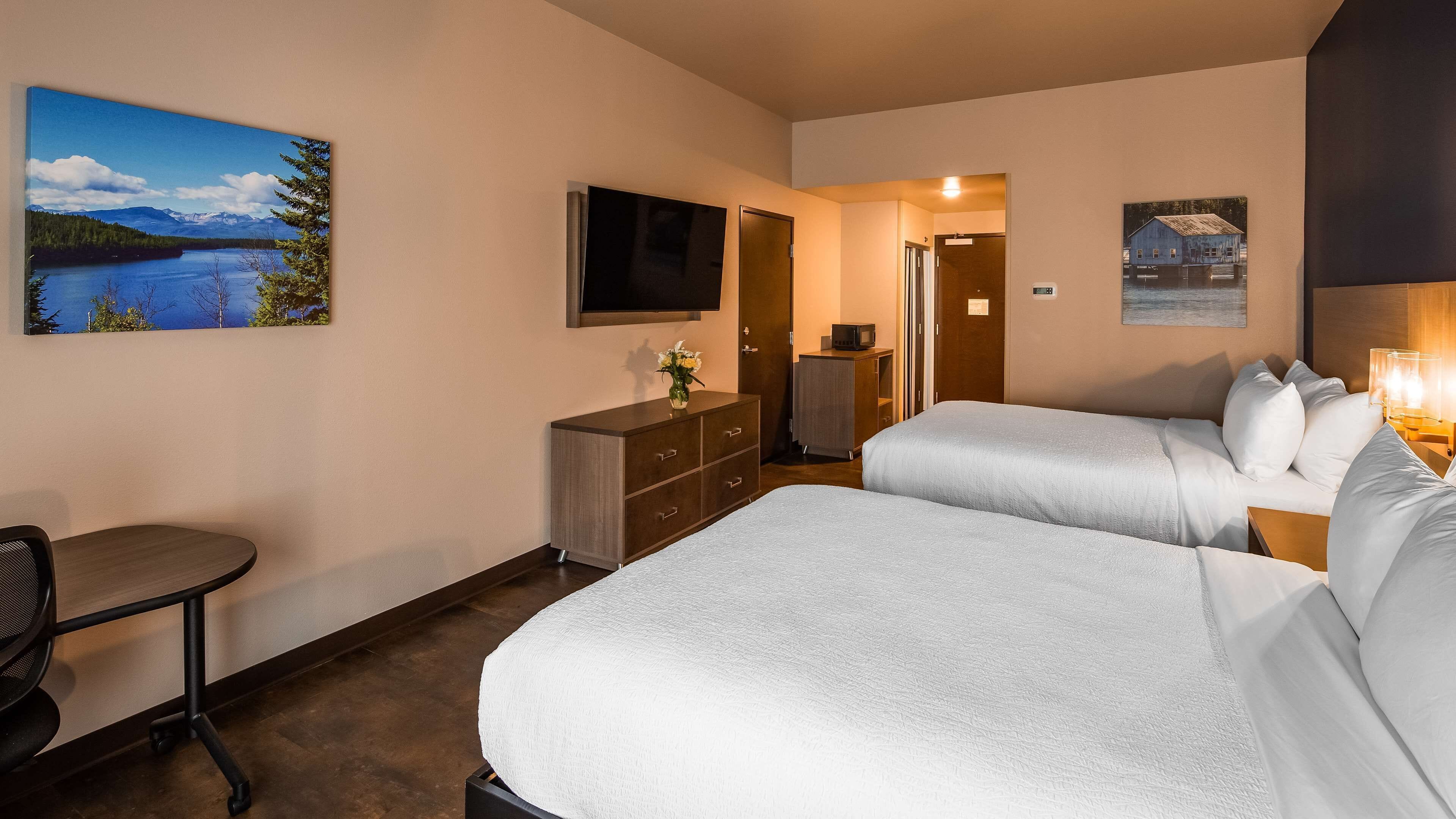 hypo-allergenic bedding, desk, laptop workspace, blackout curtains