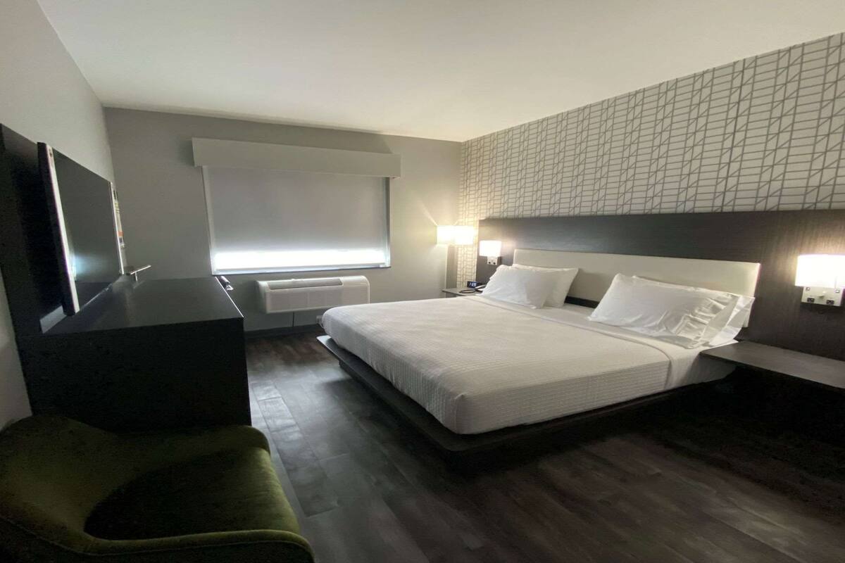 Premium bedding, memory foam beds, desk, laptop workspace