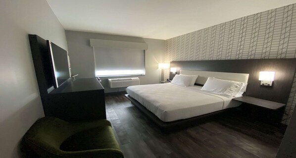 Premium bedding, memory-foam beds, desk, laptop workspace