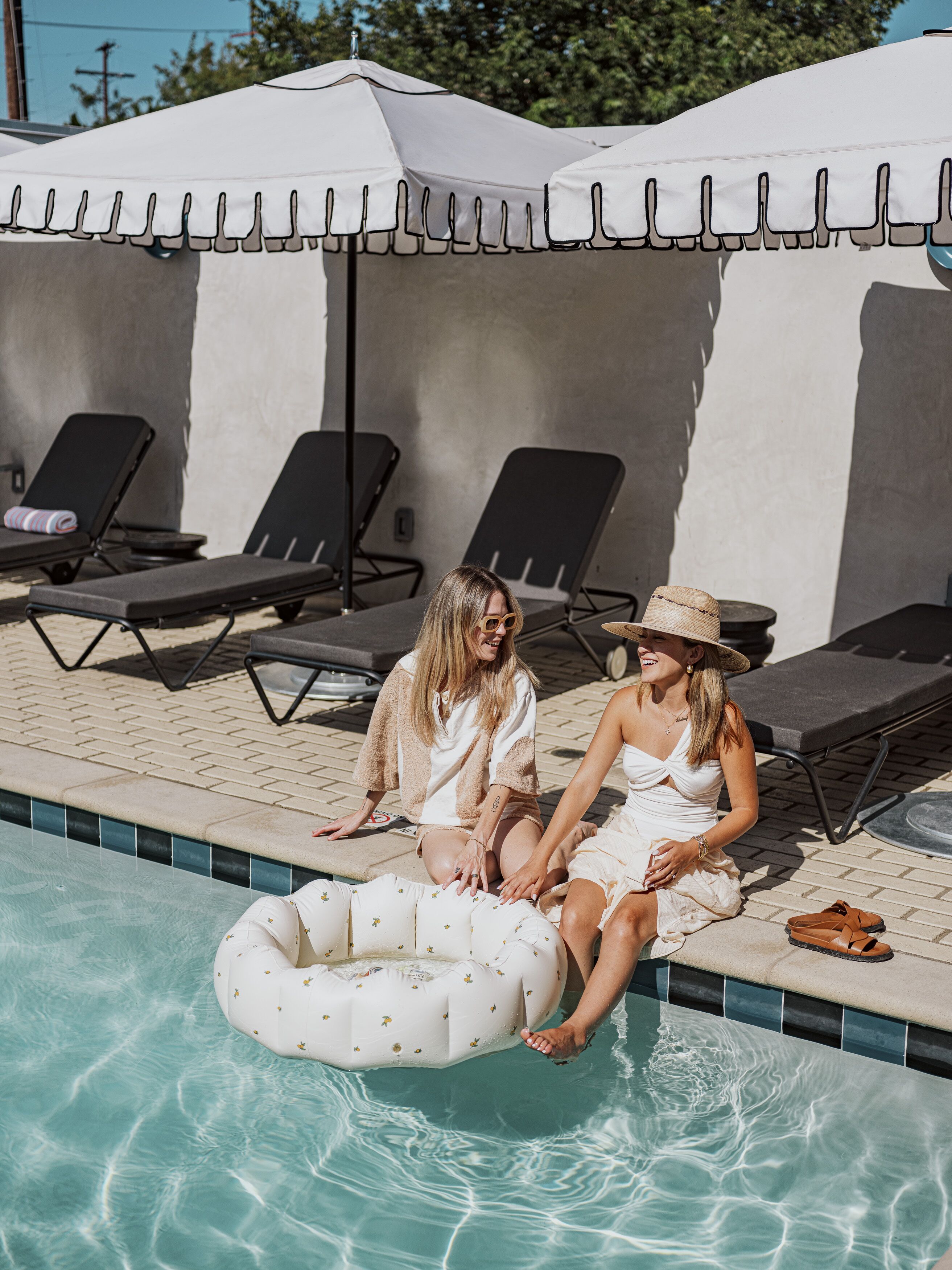 outdoor pool, pool umbrellas, pool loungers