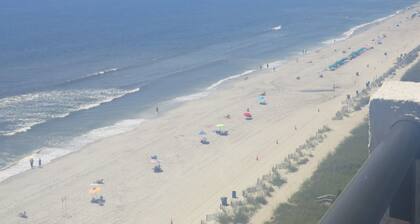 1445 Elegant On The Beach Corner Queen Suite, near Airport with Fireplace