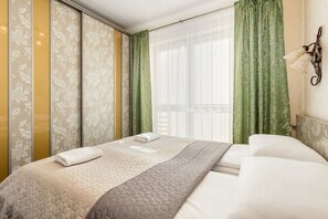 2 habitaciones, tabla de planchar con plancha, wifi y ropa de cama 