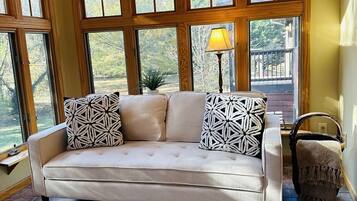 Smart TV, fireplace, foosball, books