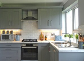 Microwave, electric kettle, high chair