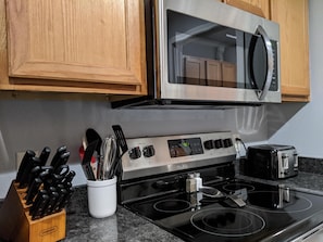 Condo (Travel Tips - **NEW** Walk out - POOL) | Private kitchen
