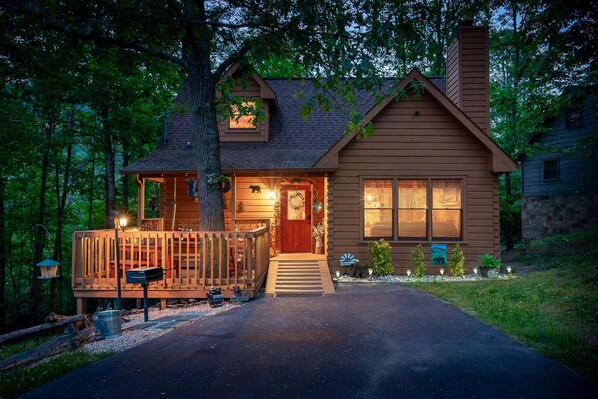A rustic cabin with a wooden deck, a chimney, and a front porch. - Summer Specials! Cozy Cabin, ADA, HotTub, Easy Drive, 3Bdm+Nook, Family Retreat (Sevierville)