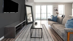 Studio, 1 Queen Bed | Iron/ironing board, WiFi (free), individually decorated - Park Avenue Condos (Detroit)