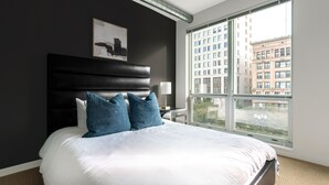 Condo, 1 Bedroom | Iron/ironing board, WiFi (free), individually decorated - Park Avenue Condos (Detroit)