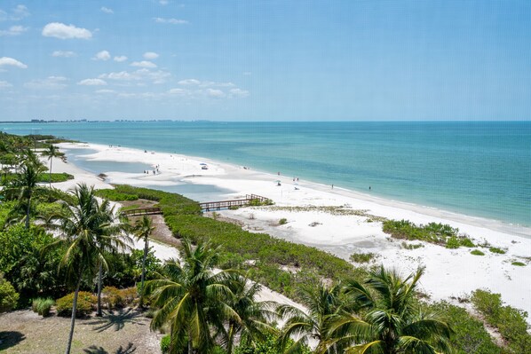 On the beach, sun loungers, beach towels