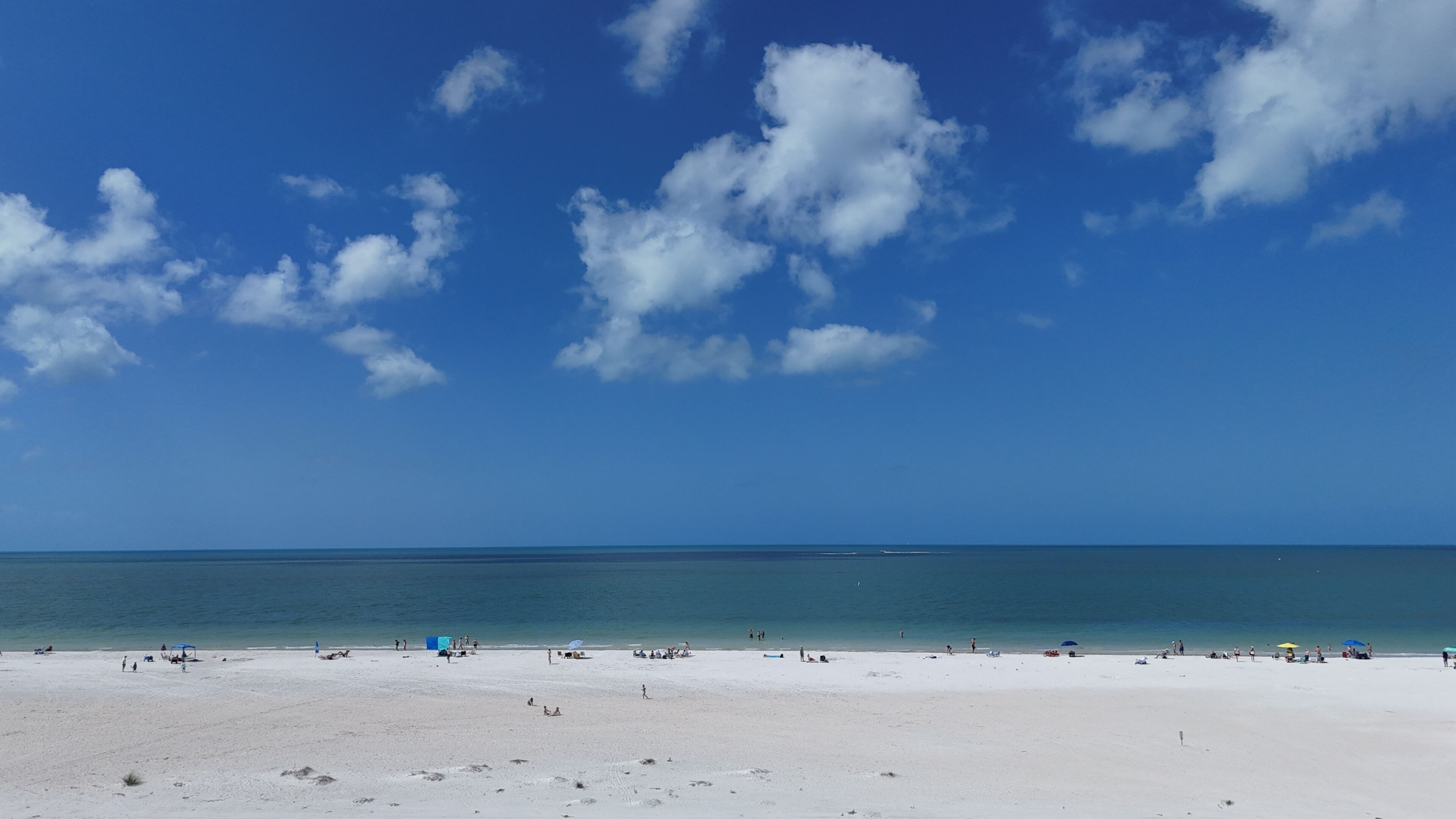 On the beach, sun loungers, beach towels