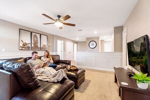 Smart TV, video games, DVD player, foosball