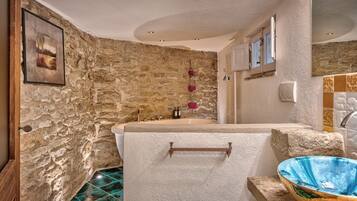 Bathtub, hair dryer, bidet, towels