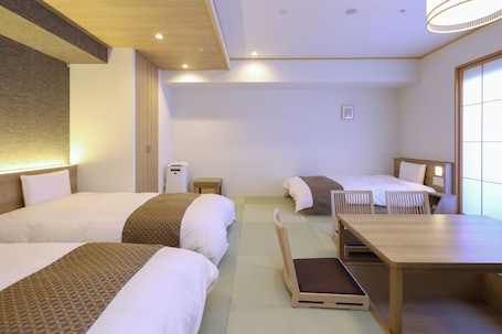 Japanese-style deluxe room (3 beds)- Non-Smoking | Down comforters, in-room safe, blackout drapes, soundproofing. Dormy Inn Premium Ginza Hot Springs