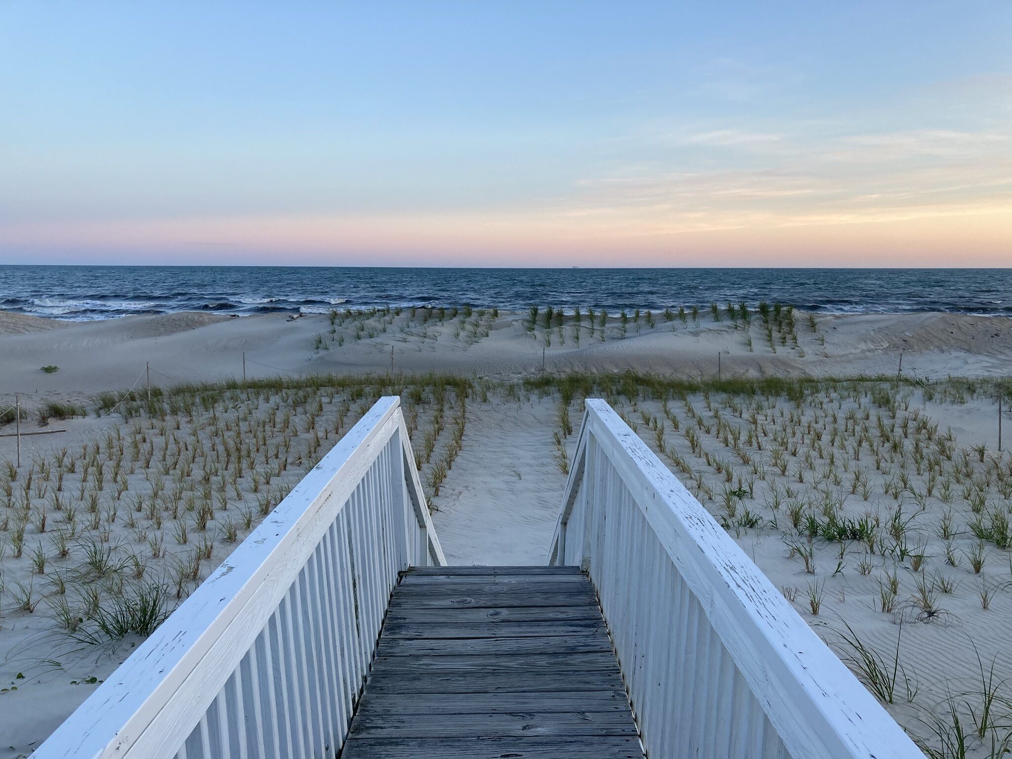 Charming Beachfront Cottage Awaits You! Direct access to beach off deck/walkway.