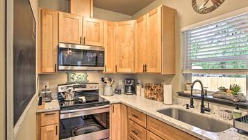 Fridge, microwave, stovetop, cookware/dishes/utensils