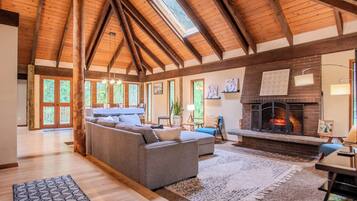 Smart TV, fireplace, table football, books