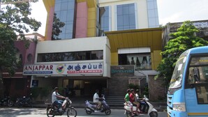 A multi-story building with a restaurant named "Anjappar" and "Devis Grand" on the ground floor. - Devis Grand (Puducherry)