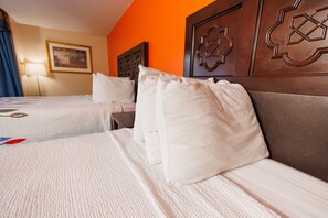 Family Suite with Two Beds with Garden/Pool View | Desk, soundproofing, iron/ironing board, free WiFi