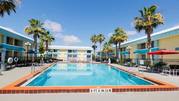 Outdoor pool, open 9:00 AM to 9:00 PM, pool umbrellas, sun loungers